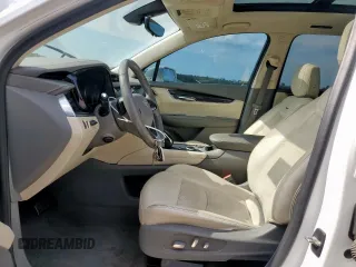 2020 Cadillac XT6 FWD Premium Luxury z VIN 1GYKPCRS9LZ107178, wystawiony jako Copart lot #58789335 z przebiegiem 154 428 mil mil oraz Nie do naprawy. Historia ofert i sprzedaży dostępna na DreamBid. Obrazek 7.