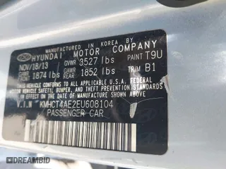 2014 Hyundai Accent GLS with VIN KMHCT4AE2EU608104, listed as a IAAI auction lot 41943590 with 125,808 mi miles. Bid and sale history available at carsss.com. Image 9.