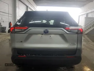 2020 Toyota RAV4 Hybrid XLE with VIN 2T3R6RFV1LW001235, listed as a Copart auction lot 56818635 with 105,234 mi miles and Salvage title. Bid and sale history available at DreamBid. Image 6.