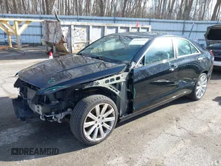 2014 Cadillac ATS Luxury AWD z VIN 1G6AH5RX7E0187421, wystawiony jako IAAI lot #41864984 z przebiegiem 102 927 mil mil oraz . Historia ofert i sprzedaży dostępna na DreamBid. Obrazek 2.