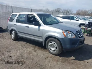 2006 Honda CR-V LX with VIN JHLRD785X6C057434, listed as a IAAI auction lot 41881971 with 210,658 mi miles and . Bid and sale history available at carsss.com. Image 1.