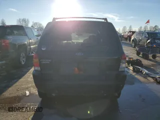2004 Ford Escape Limited z VIN 1FMCU04184KA70257, wystawiony jako Copart lot #89130575 z przebiegiem 186 430 mil mil oraz Szkoda całkowita • Salvage title. Historia ofert i sprzedaży dostępna na DreamBid. Obrazek 6.