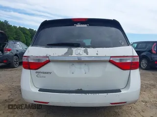 2012 Honda Odyssey LX z VIN 5FNRL5H28CB096385, wystawiony jako IAAI lot #42304664 z przebiegiem 105 010 mil mil oraz . Historia ofert i sprzedaży dostępna na DreamBid. Obrazek 16.