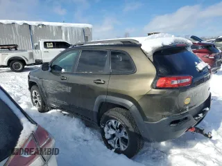 2014 Jeep Cherokee Trailhawk with VIN 1C4PJMBS2EW310818, listed as a Copart auction lot 44581755 with 105,560 mi miles and Non repairable. Bid and sale history available at DreamBid. Image 2.