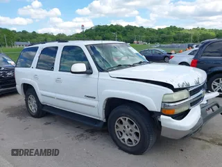 2002 Chevrolet Tahoe Z71 z VIN 1GNEK13Z32R326011, wystawiony jako IAAI lot #42181335 z przebiegiem 315 321 mil mil oraz . Historia ofert i sprzedaży dostępna na DreamBid. Obrazek 13.