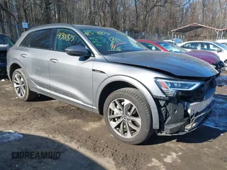 2021 Audi e-tron Premium Plus with VIN WA1LAAGE3MB005876, listed as a IAAI auction lot 41301875 with 37,017 mi miles. Bid and sale history available at carsss.com. Image 1.
