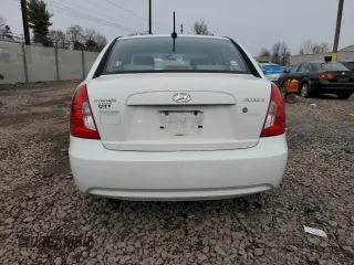 2009 Hyundai Accent Auto GLS with VIN KMHCN46C29U312569, listed as a Copart auction lot 51481165 with 173,998 mi miles and Salvage Title. Bid and sale history available at carsss.com. Image 6.
