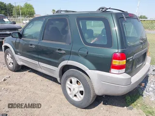2001 Ford Escape XLT with VIN 1FMYU04101KE97210, listed as a IAAI auction lot 42277209 with 173,335 mi miles and . Bid and sale history available at DreamBid. Image 3.