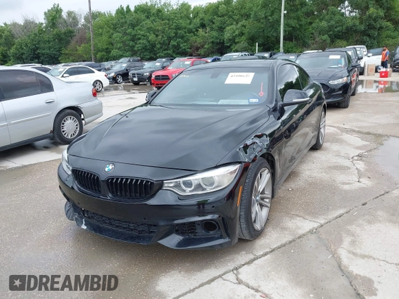 2014 BMW 4 Series 428i with VIN WBA3N7C58EF719495, listed as a IAAI auction lot 42490625 with 179,410 mi miles and . Bid and sale history available at DreamBid. Image 2.