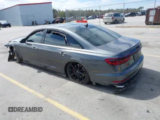2022 Audi S8 with VIN WAULSAF83NN001905, listed as a IAAI auction lot 41813861 with 18,461 mi miles and . Bid and sale history available at DreamBid. Image 3.