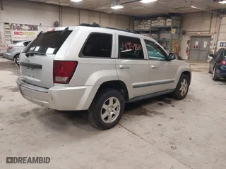 2009 Jeep Grand Cherokee Laredo with VIN 1J8GR48K89C553694, listed as a IAAI auction lot 41984820 with 196,266 mi miles. Bid and sale history available at carsss.com. Image 4.