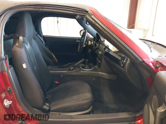 2007 Mazda MX-5 Miata Sport z VIN JM1NC25F970132299, wystawiony jako IAAI lot #41622791 z przebiegiem 72 392 mil mil oraz . Historia ofert i sprzedaży dostępna na DreamBid. Obrazek 5.