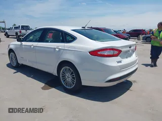 2014 Ford Fusion SE Hybrid with VIN 3FA6P0LUXER233658, listed as a IAAI auction lot 42311588 with 106,282 mi miles and . Bid and sale history available at DreamBid. Image 3.