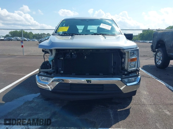 2021 Ford F-150 XL z VIN 1FTEW1CB8MKE90821, wystawiony jako IAAI lot #42733214 z przebiegiem 74 371 mil mil oraz . Historia ofert i sprzedaży dostępna na DreamBid. Obrazek 12.