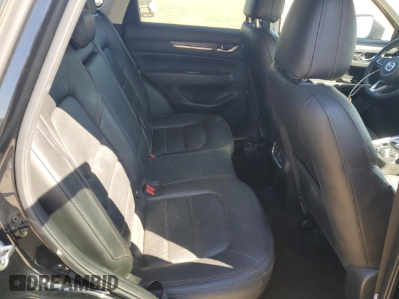 2018 Mazda CX-5 Grand Touring с VIN JM3KFADM2J1310339, выставлен на аукционе Copart как лот 64705245 с пробегом 63 927 миль миль и Списание • Salvage title. История ставок и продаж доступна на DreamBid. Изображение 11.