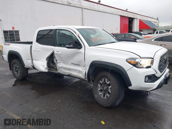 2021 Toyota Tacoma 4WD SR5 with VIN 3TMDZ5BN6MM108851, listed as a IAAI auction lot 41513057 with 25,261 mi miles. Bid and sale history available at carsss.com. Image 6.
