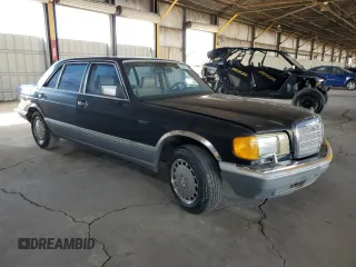 1986 Mercedes-Benz 560 with VIN WDBCA39D7GA259749, listed as a Copart auction lot 70691454 with 186,131 mi miles and Clean Title. Bid and sale history available at DreamBid. Image 4.