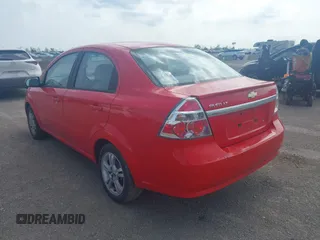 2011 Chevrolet Aveo 1LT with VIN KL1TD5DE1BB144692, listed as a IAAI auction lot 41908565 with 104,691 mi miles and . Bid and sale history available at DreamBid. Image 3.