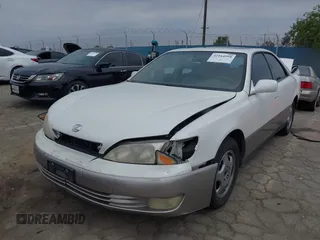 1998 Lexus ES 300 z VIN JT8BF28G0W5041081, wystawiony jako IAAI lot #42164998 z przebiegiem 151 272 mil mil oraz . Historia ofert i sprzedaży dostępna na DreamBid. Obrazek 2.