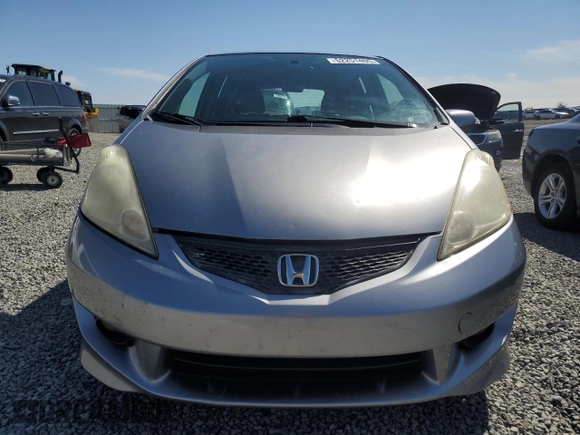 2009 Honda Fit Sport z VIN JHMGE88489S010278, wystawiony jako Copart lot #52251405 z przebiegiem 120 511 mil mil oraz Szkoda całkowita • Salvage title. Historia ofert i sprzedaży dostępna na DreamBid. Obrazek 5.