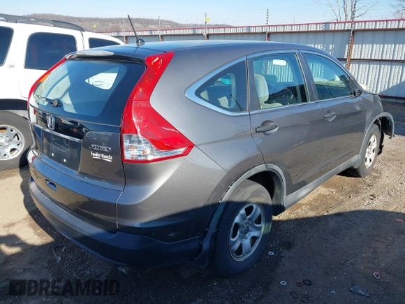 2014 Honda CR-V LX with VIN 2HKRM4H39EH634676, listed as a IAAI auction lot 41233279 with 153,761 mi miles and . Bid and sale history available at carsss.com. Image 4.