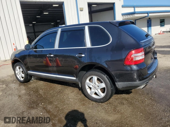 2004 Porsche Cayenne S with VIN WP1AB29P54LA69344, listed as a Copart auction lot 77030654 with 248,249 mi miles and Salvage Title. Bid and sale history available at carsss.com. Image 2.
