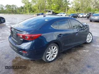 2015 Mazda 3 S Grand Touring z VIN JM1BM1W35F1238188, wystawiony jako IAAI lot #41206030 z przebiegiem 316 542 mil mil oraz . Historia ofert i sprzedaży dostępna na DreamBid. Obrazek 4.