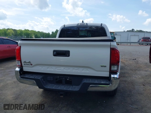 2021 Toyota Tacoma SR z VIN 5TFCZ5AN5MX265181, wystawiony jako IAAI lot #42077902 z przebiegiem 102 192 mil mil oraz . Historia ofert i sprzedaży dostępna na DreamBid. Obrazek 16.