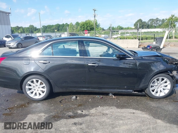 2014 Cadillac CTS RWD with VIN 1G6AP5SX9E0134183, listed as a IAAI auction lot 42190674 with 59,603 mi miles and . Bid and sale history available at DreamBid. Image 14.