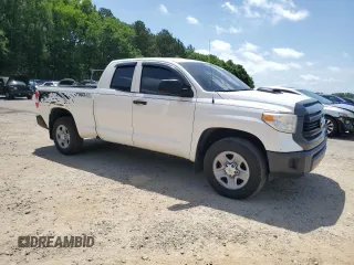 2015 Toyota Tundra SR with VIN 5TFRM5F11FX092454, listed as a Copart auction lot 57404175 with 87,717 mi miles and Salvage title. Bid and sale history available at DreamBid. Image 4.