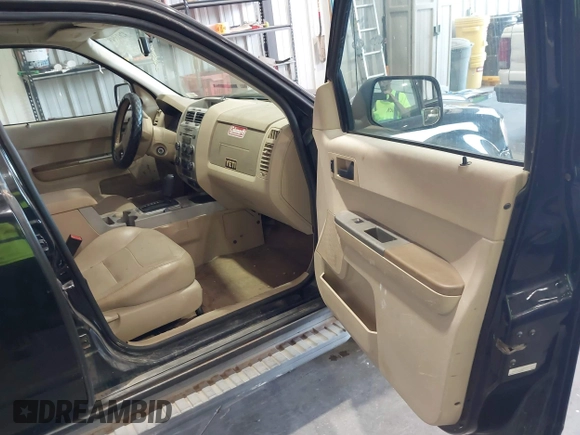 2008 Ford Escape XLT with VIN 1FMCU03168KE47773, listed as a IAAI auction lot 42626549 with 316,573 mi miles and . Bid and sale history available at DreamBid. Image 5.
