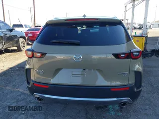 2023 Mazda CX-50 2.5 Turbo Premium Plus Package with VIN 7MMVABEY1PN100568, listed as a IAAI auction lot 41313754 with 31,325 mi miles. Bid and sale history available at carsss.com. Image 17.