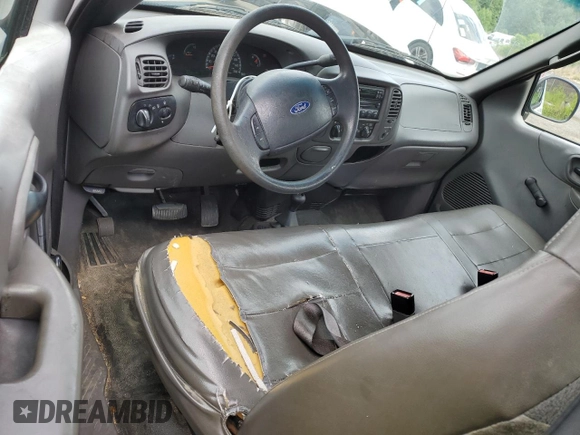 2004 Ford F-150 with VIN 2FTRF08294CA16417, listed as a Copart auction lot 58192935 with 233,414 mi miles and Salvage title. Bid and sale history available at DreamBid. Image 8.