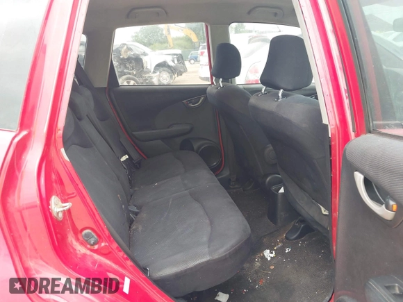 2009 Honda Fit Sport z VIN JHMGE88609S016304, wystawiony jako IAAI lot #42385175 z przebiegiem 254 317 mil mil oraz . Historia ofert i sprzedaży dostępna na DreamBid. Obrazek 8.