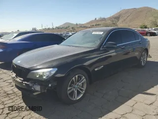 2015 BMW 7 Series 740Li with VIN WBAYE4C59FD947328, listed as a Copart auction lot 68987863 with 117,312 mi miles and . Bid and sale history available at DreamBid. Image 1.