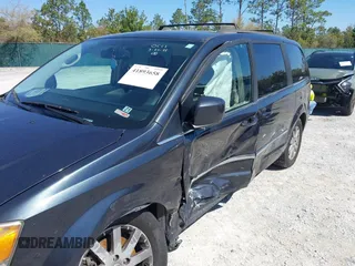 2014 Chrysler Town & Country Touring with VIN 2C4RC1BG6ER217760, listed as a IAAI auction lot 41893658 with 171,560 mi miles. Bid and sale history available at carsss.com. Image 6.