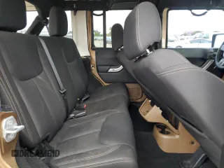 2015 Jeep Wrangler Unlimited Sahara z VIN 1C4BJWEG5FL645846, wystawiony jako Copart lot #53326855 z przebiegiem 122 510 mil mil oraz Szkoda całkowita • Salvage title. Historia ofert i sprzedaży dostępna na DreamBid. Obrazek 12.