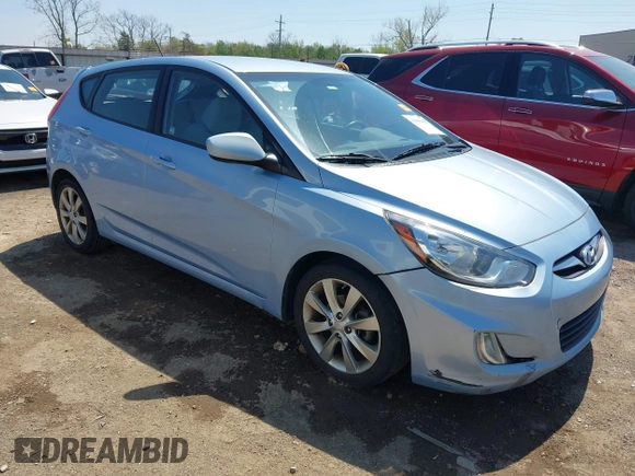 2012 Hyundai Accent SE with VIN KMHCU5AE0CU022050, listed as a IAAI auction lot 41955452 with 140,460 mi miles. Bid and sale history available at carsss.com. Image 1.