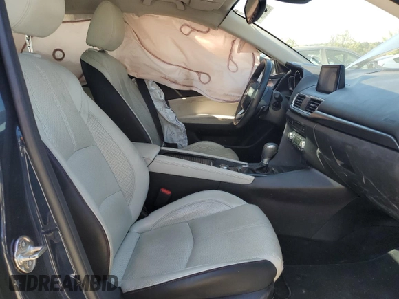 2017 Mazda 3 Grand Touring z VIN JM1BN1M3XH1117241, wystawiony jako Copart lot #53499295 z przebiegiem 63 886 mil mil oraz Szkoda całkowita • Salvage title. Historia ofert i sprzedaży dostępna na DreamBid. Obrazek 7.