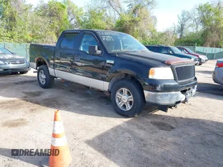 2005 Ford F-150 XLT with VIN 1FTPW145X5FA51759, listed as a IAAI auction lot 42077373 with 131,425 mi miles. Bid and sale history available at carsss.com. Image 1.