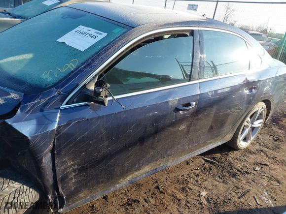 2015 Volkswagen Passat 2.0L TDI SE w/Sunroof with VIN 1VWBV7A34FC021031, listed as a IAAI auction lot 41601548 with 173,402 mi miles. Bid and sale history available at carsss.com. Image 14.