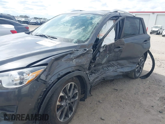2016 Mazda CX-5 Grand Touring with VIN JM3KE4DY9G0845707, listed as a IAAI auction lot 41709685 with 96,351 mi miles. Bid and sale history available at carsss.com. Image 6.