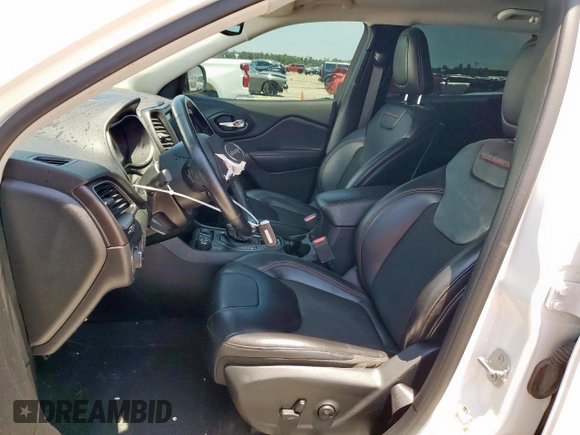 2020 Jeep Cherokee Trailhawk с VIN 1C4PJMBX4LD609103, выставлен на аукционе Copart как лот 60469955 с пробегом 70 179 миль миль и Списание • Salvage title. История ставок и продаж доступна на DreamBid. Изображение 7.