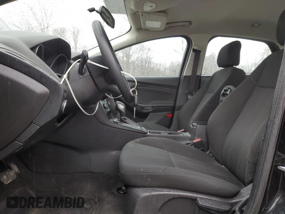 2017 Ford Focus SE with VIN 1FADP3F2XHL316724, listed as a Copart auction lot 52321155 with 137,005 mi miles and Salvage Title. Bid and sale history available at DreamBid. Image 7.