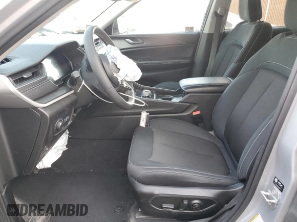2023 Jeep Grand Cherokee Laredo with VIN 1C4RJHAG0PC674527, listed as a Copart auction lot 58538195 with 37,434 mi miles and Salvage title. Bid and sale history available at DreamBid. Image 7.