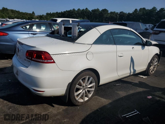 2015 Volkswagen Eos Komfort with VIN WVWBW8AH8FV002701, listed as a Copart auction lot 68676484 with 11,646 mi miles and Salvage Title. Bid and sale history available at DreamBid. Image 3.