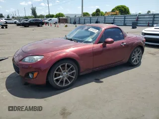 2010 Mazda MX-5 Miata Grand Touring with VIN JM1NC2FF6A0206882, listed as a Copart auction lot 56144225 with 125,049 mi miles and Clean title. Bid and sale history available at DreamBid. Image 1.