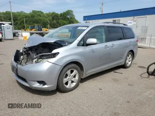 2014 Toyota Sienna LE AAS with VIN 5TDKK3DCXES499287, listed as a Copart auction lot 58868115 with 200,028 mi miles and Salvage title. Bid and sale history available at DreamBid. Image 1.