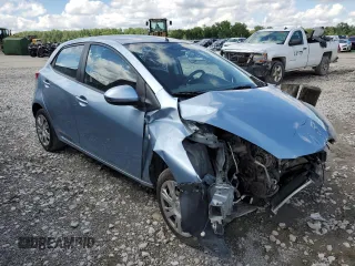 2013 Mazda 2 Sport with VIN JM1DE1KY5D0162904, listed as a Copart auction lot 57712794 with 138,718 mi miles and Salvage Title. Bid and sale history available at carsss.com. Image 4.
