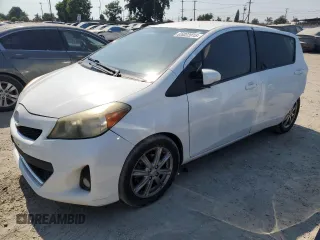 2012 Toyota Yaris L with VIN JTDKTUD30CD527531, listed as a Copart auction lot 65022015 with 157,177 mi miles and Salvage title. Bid and sale history available at DreamBid. Image 1.
